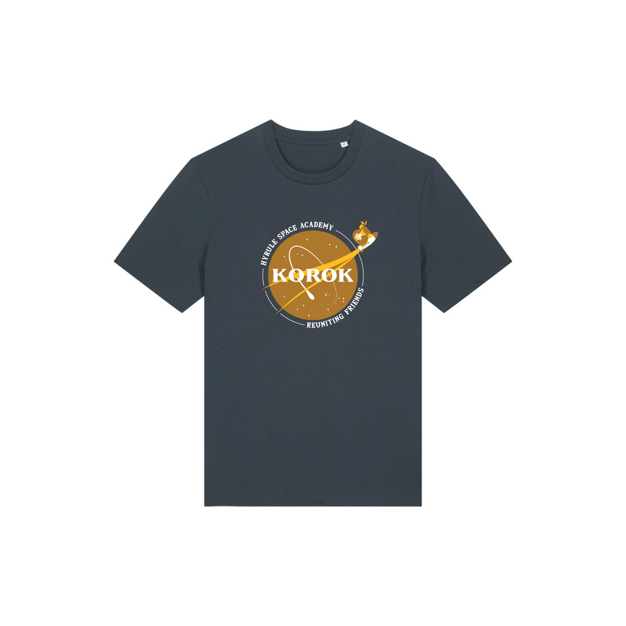 This iconic unisex t-shirt, the STTU169 Stanley/Stella Creator 2.0 in India Ink Grey (C715), showcases a circular logo featuring a brown star-shaped character alongside the text: "KOROK" and "FERENI SPACE ACADEMY, REDINGTON 2021." Crafted by Stanley/Stella from 100% organic cotton, it combines style with sustainability.